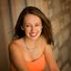 High School Graduation Pictures: Senior girl beautiful smile orange dress