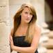 Senior Portraits: senior model posing with columns